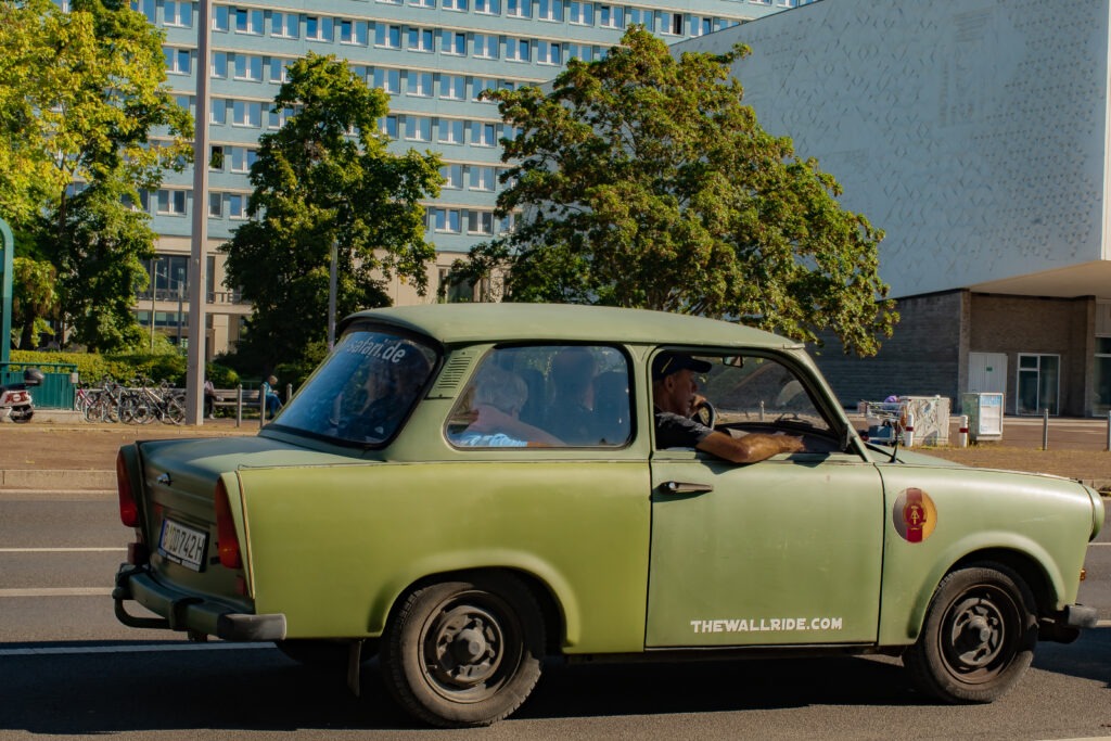 green trabi car by taking a tour on a Berlin Sunday