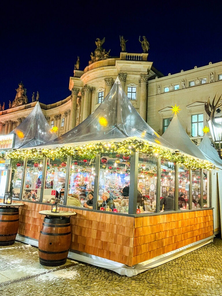 tent with restaurant inside at berlin christmas market