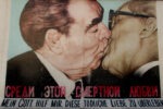 two world leaders kissing on art mural on the Berlin East Side Gallery