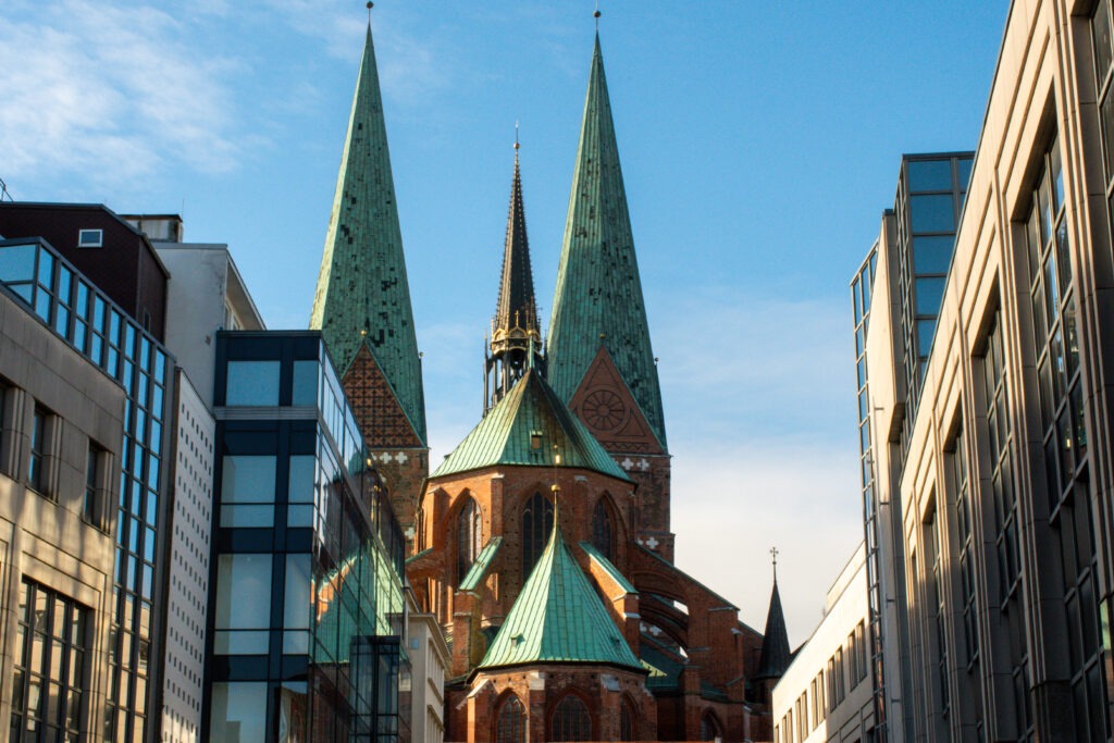church with modern buildings in Lübeck Germany