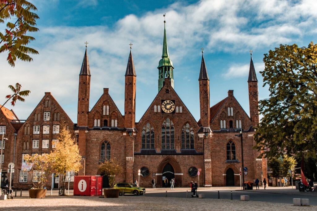 red brick hospital in lubeck germany with multiple tall spheres