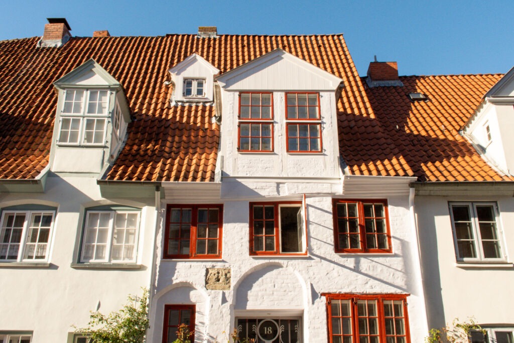 white houses with red roofs in old town as fun things to do in lubeck germany