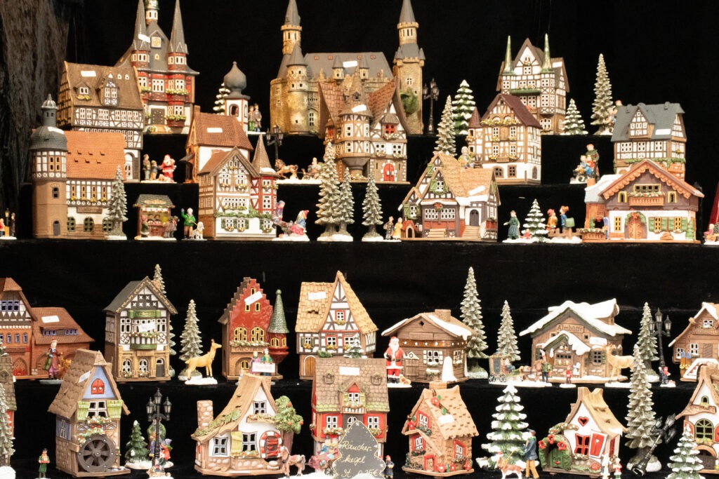 tiny houses with christmas decorations at berlin christmas markets