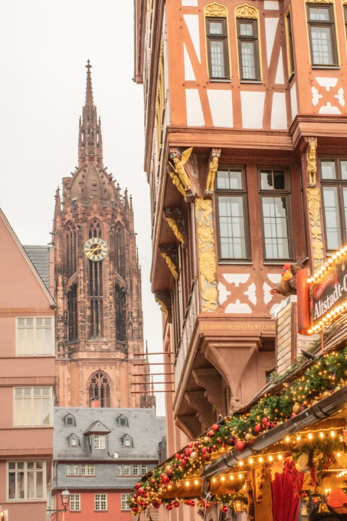 half timbered buildings with hut at best christmas market in frankfurt germany