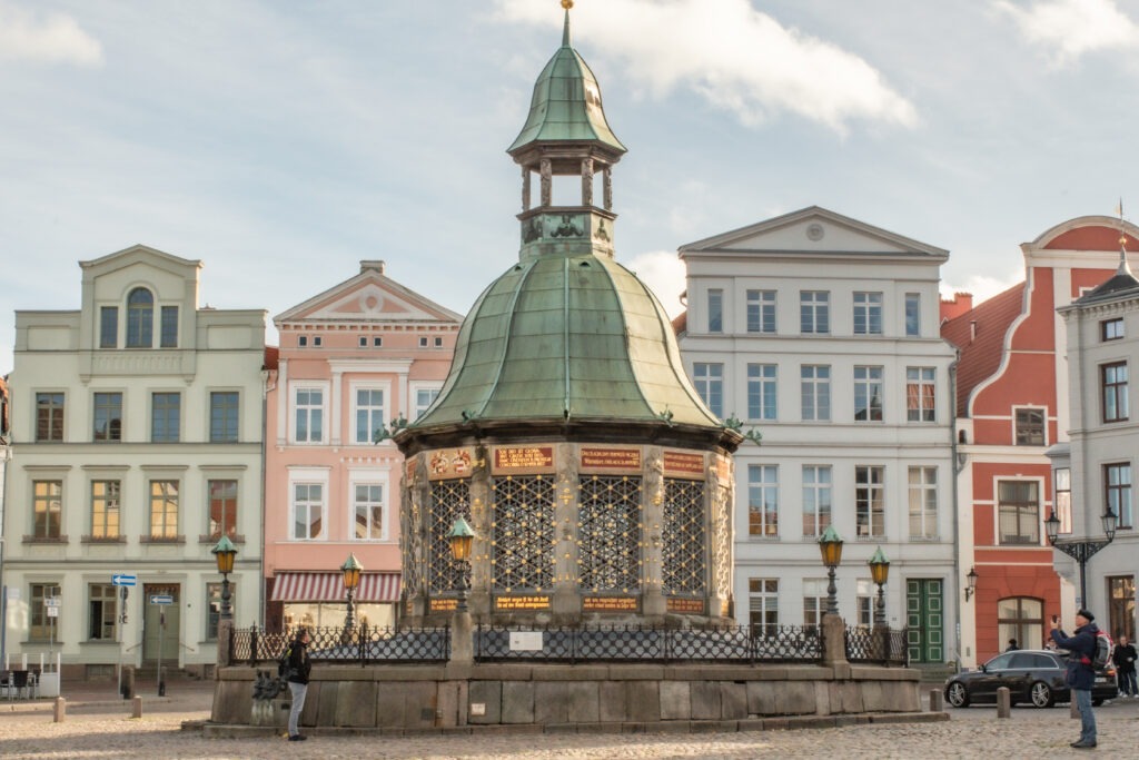colourful buildings with water tower on germany road trip itinerary