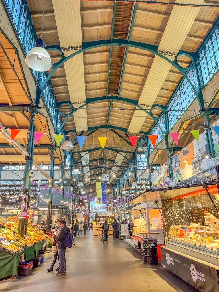 inside food market with tall ceilings on a berlin food tour