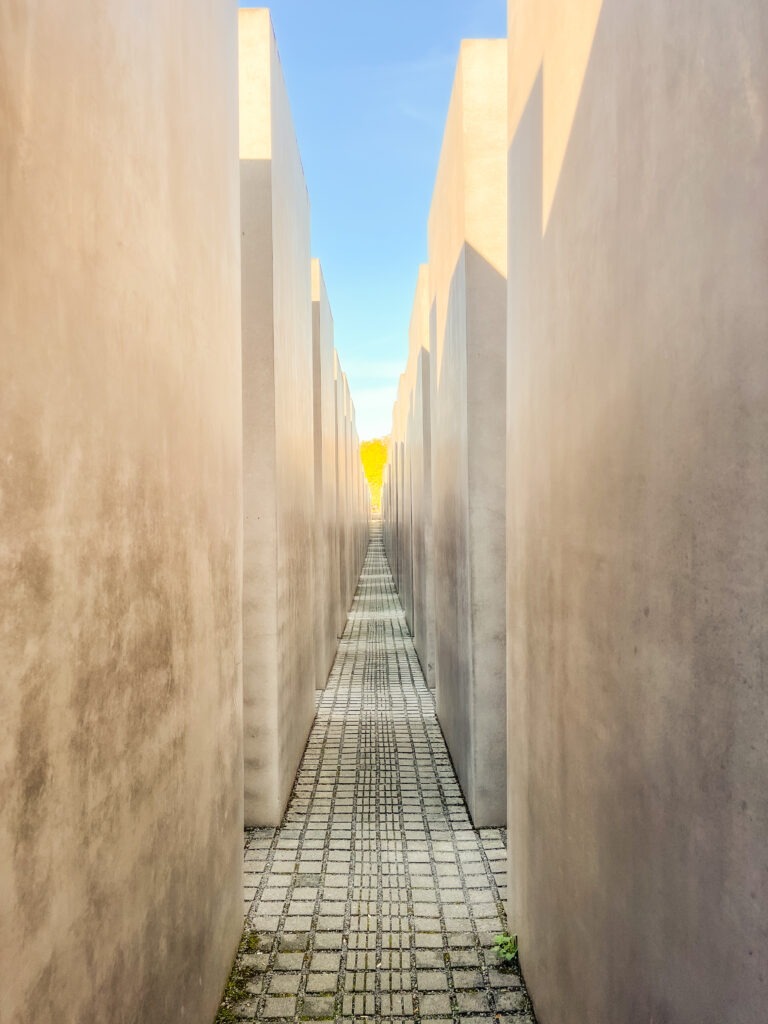 tall concrete slabs at jewish memorial in berlin 