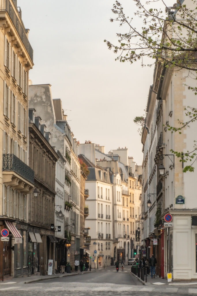 paris street with tall buildings when comparing paris vs berlin