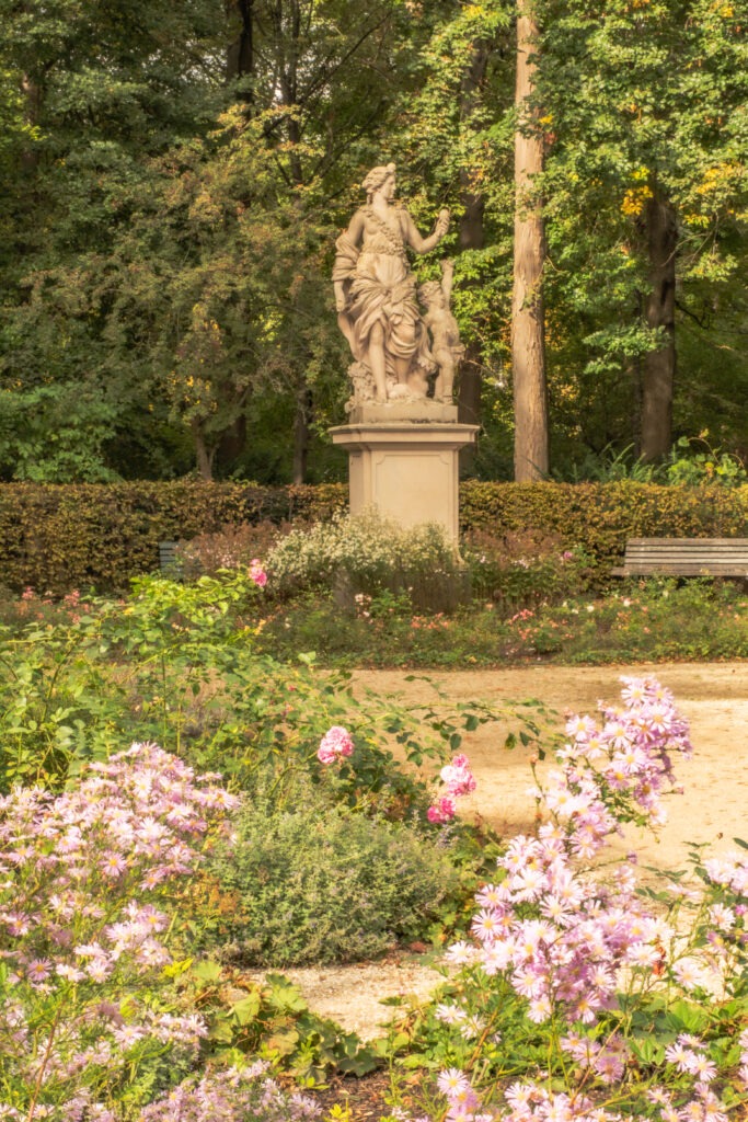 statue with flower in rosengarten tiergarten