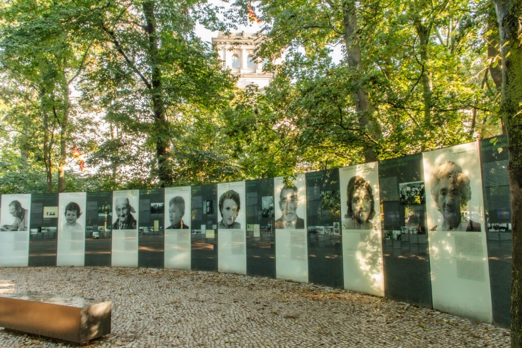 glass plaques with bench and trees in berlin tiergarten park