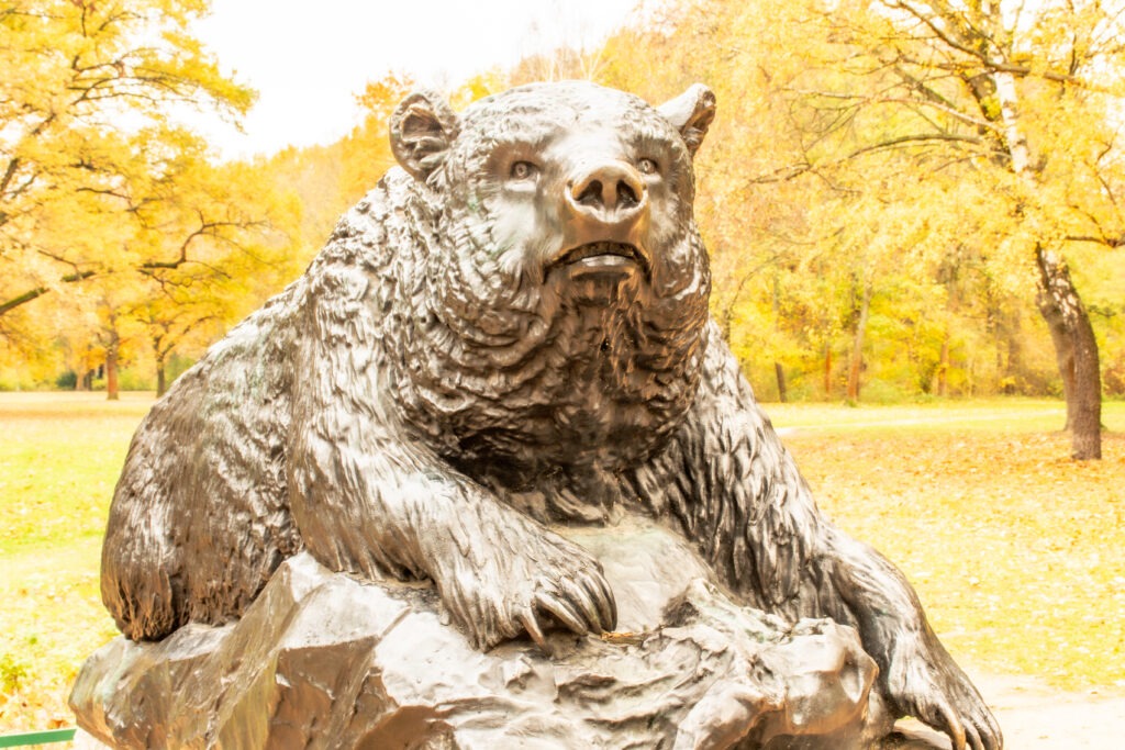bronze statue of life size bear in tiergarten park in   berlin