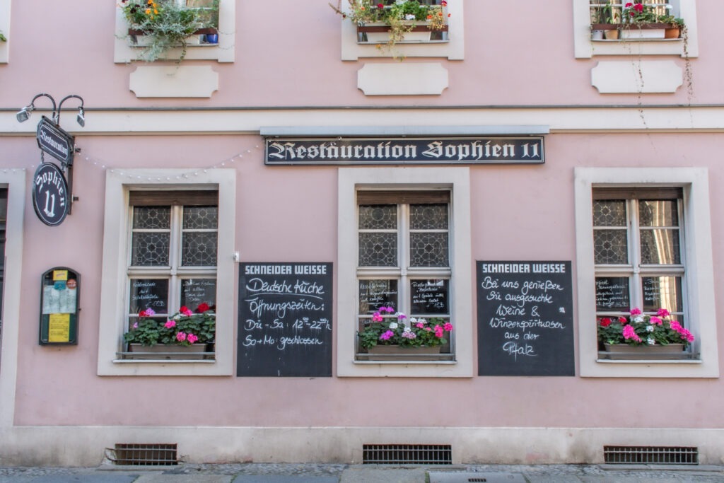 pink stucco with flower boxes at one of the best german restaurants in berlin