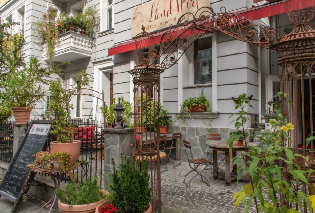 outdoor terrace with plants at one of the best german restaurants in berlin