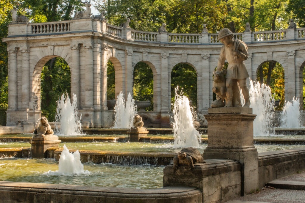 fountain with stone archway in best parks in berlin