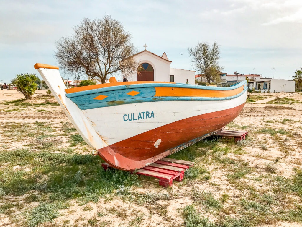 old wooden boat on tavira island as things to do tavira portugal