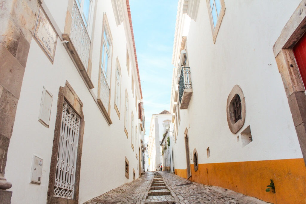 cobblestone steps leading up to town in what to do in tavira portugal