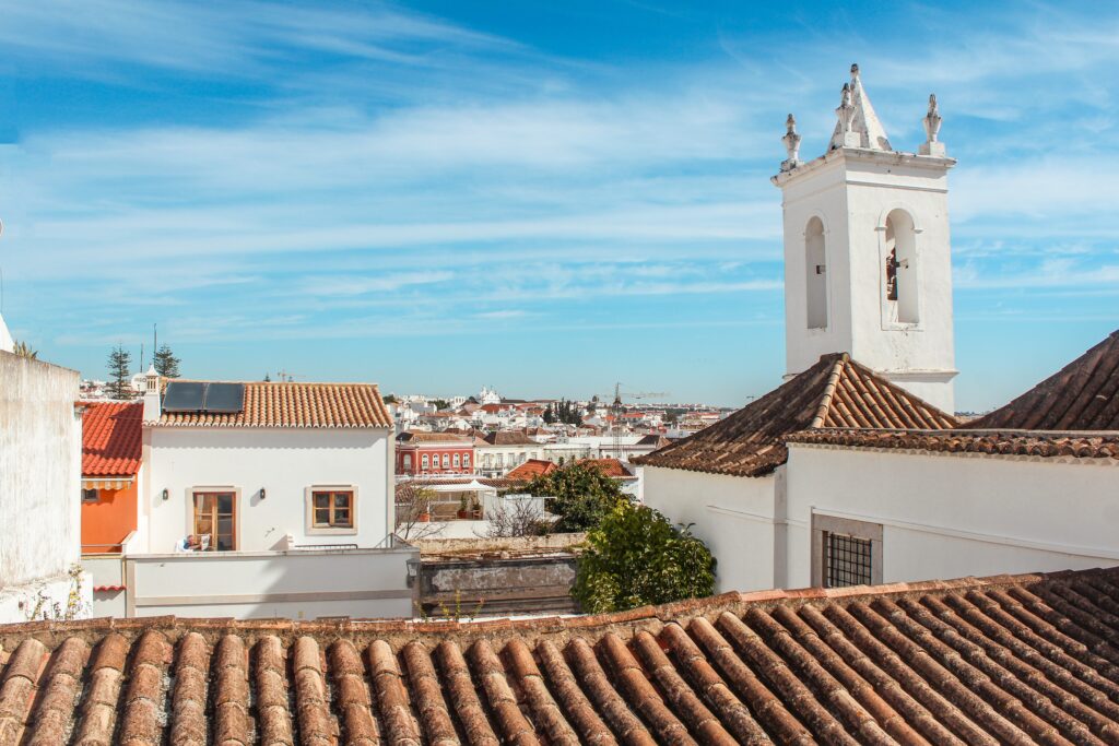 rooftops with tower in best things to do in tavira portugal