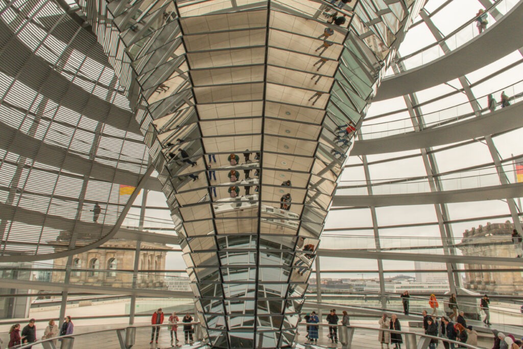 reichstag building with glass dome on a day in berlin