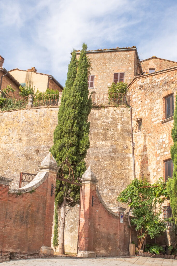 gate with stone walled city is something to do in Montepulciano