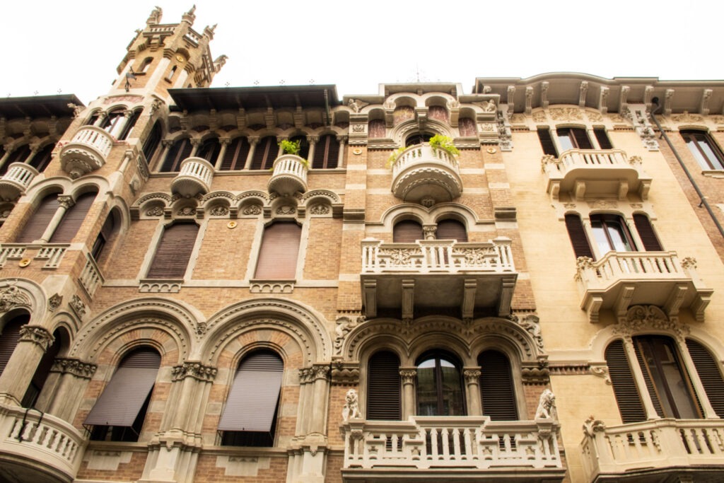 Art Nouveau in Turin: Where to Walk for Liberty Style 4 an art nouveau liberty building in turin showing balconies, rounded windows and towers