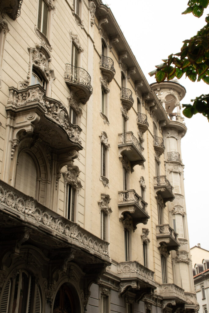 Art Nouveau in Turin: Where to Walk for Liberty Style 8 art nouveau turin building with tower and iron balconies