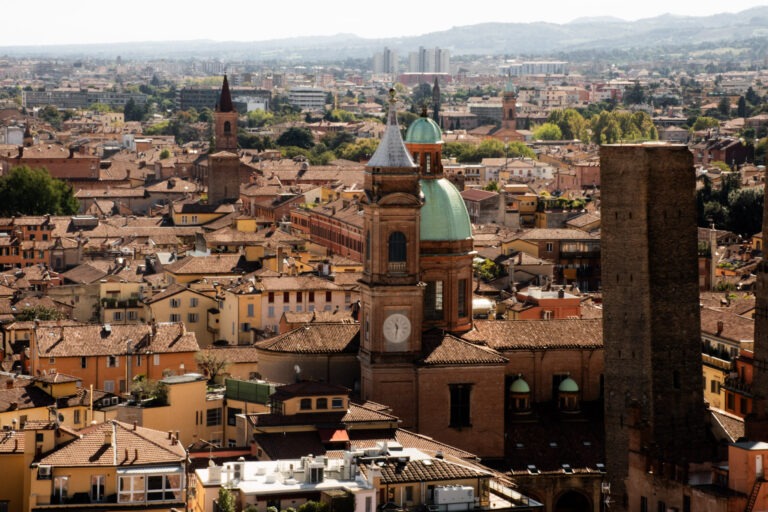 overhead view of the city of Bologna with church tower and dome