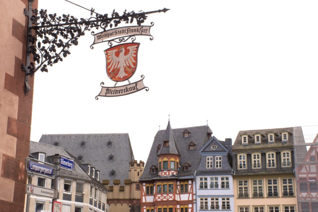 How to Experience 2 Days in Frankfurt Beyond the Usual 1 iron signage with view to the medieval buildings in frankfurt