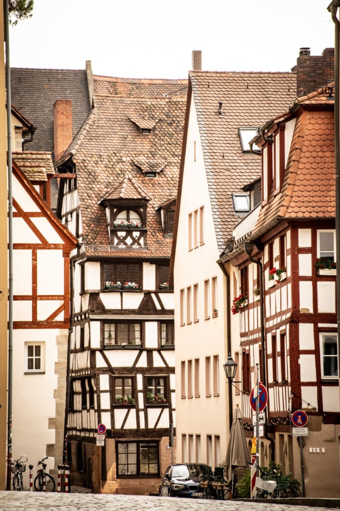 street with tall timberframed buildings while being in Nuremberg in 1 day