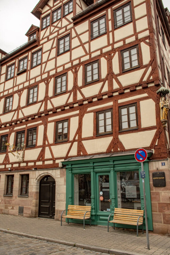 timberframed building in cream and brown with green museum storefront while in nuremberg for 2 days