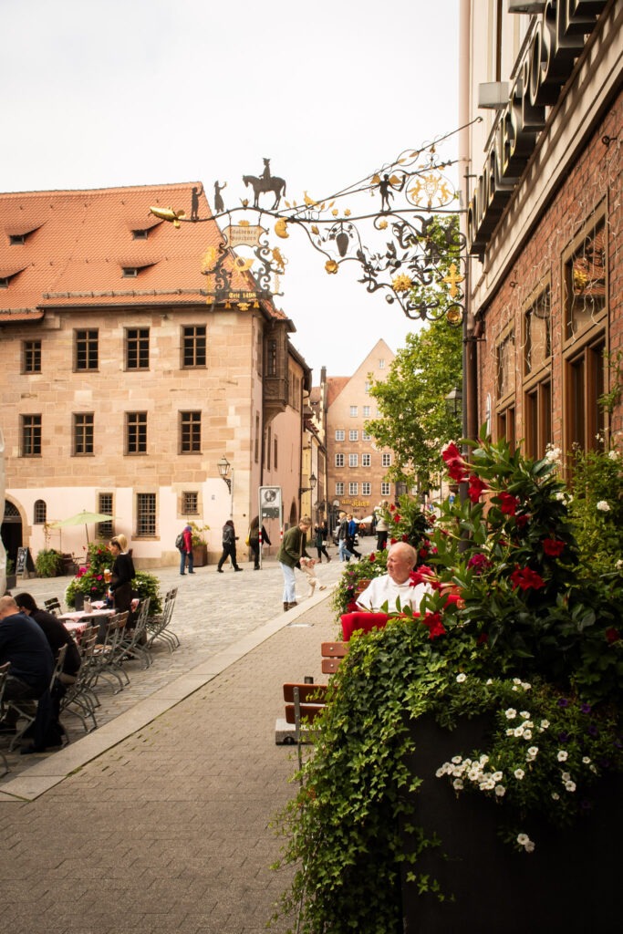 old town with diners on outdoor terrace while spending two days in nuremberg