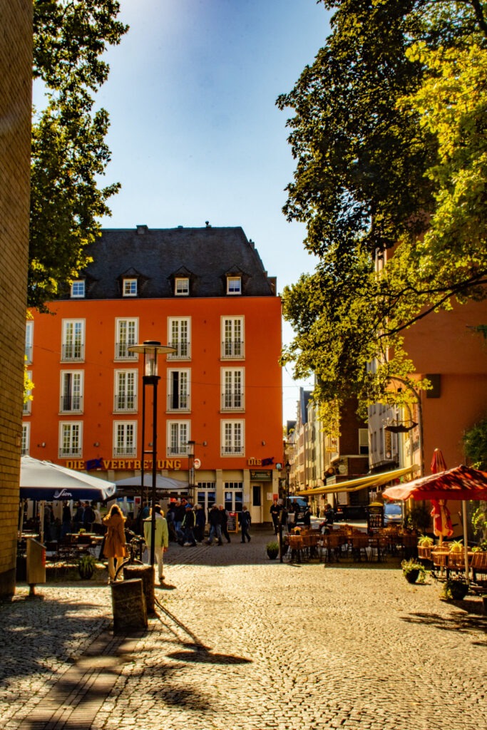 Cologne's attractions is Old Town with open square and bright red building