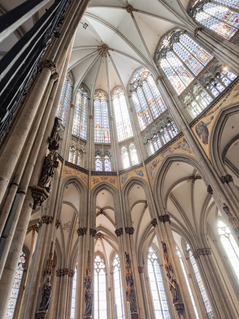 soaring ceiling with stained glass windows in the cologne cathedral