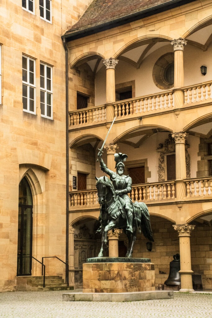 interior of courtyard from castle with bronze statue of man on horse in stuttgart germany