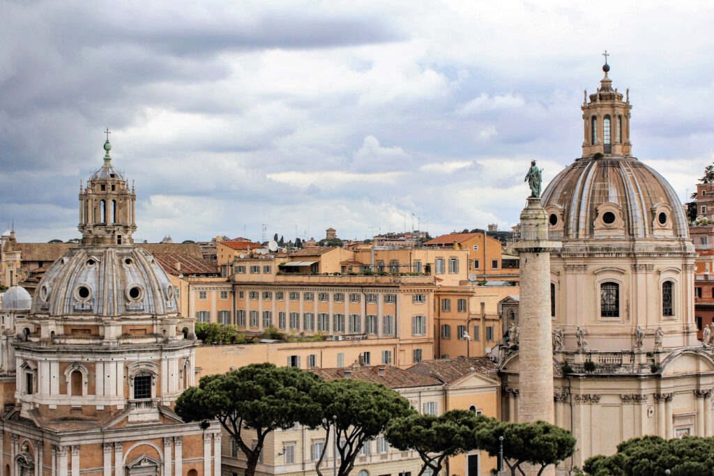 Three Days in Rome at the Right Pace 1 city view of rome showing two domes with tops of buildings while spending three days in rome italy