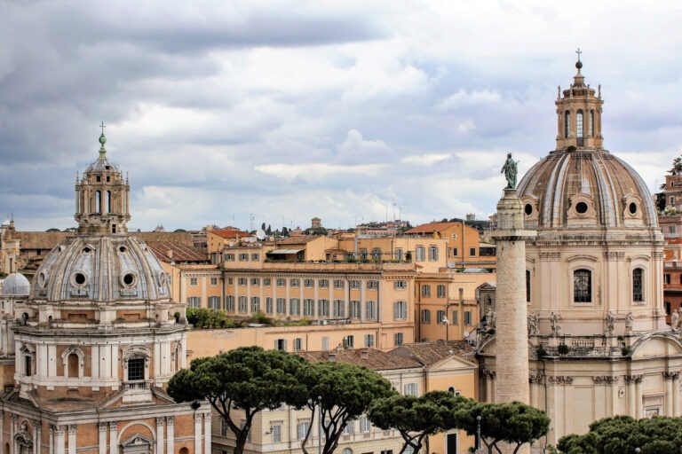 city view of rome showing two domes with tops of buildings while spending three days in rome italy