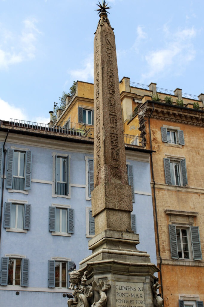 two colour buildings yellow and blue with column while spending 2 days in Rome