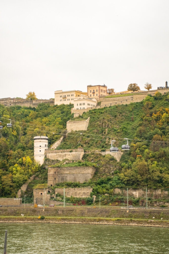 view of rhine river and gondola rides to fortress is a reason why people visit koblenz germany