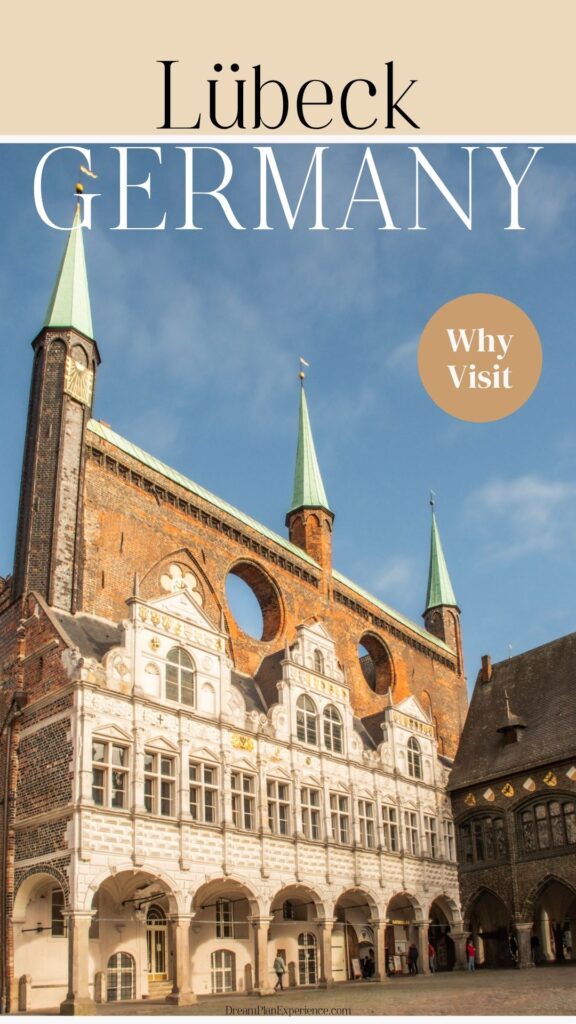 Text that reads Lubeck Germany why visit. Photo shows lubeck's city hall a white facade with gables and red brick with towers