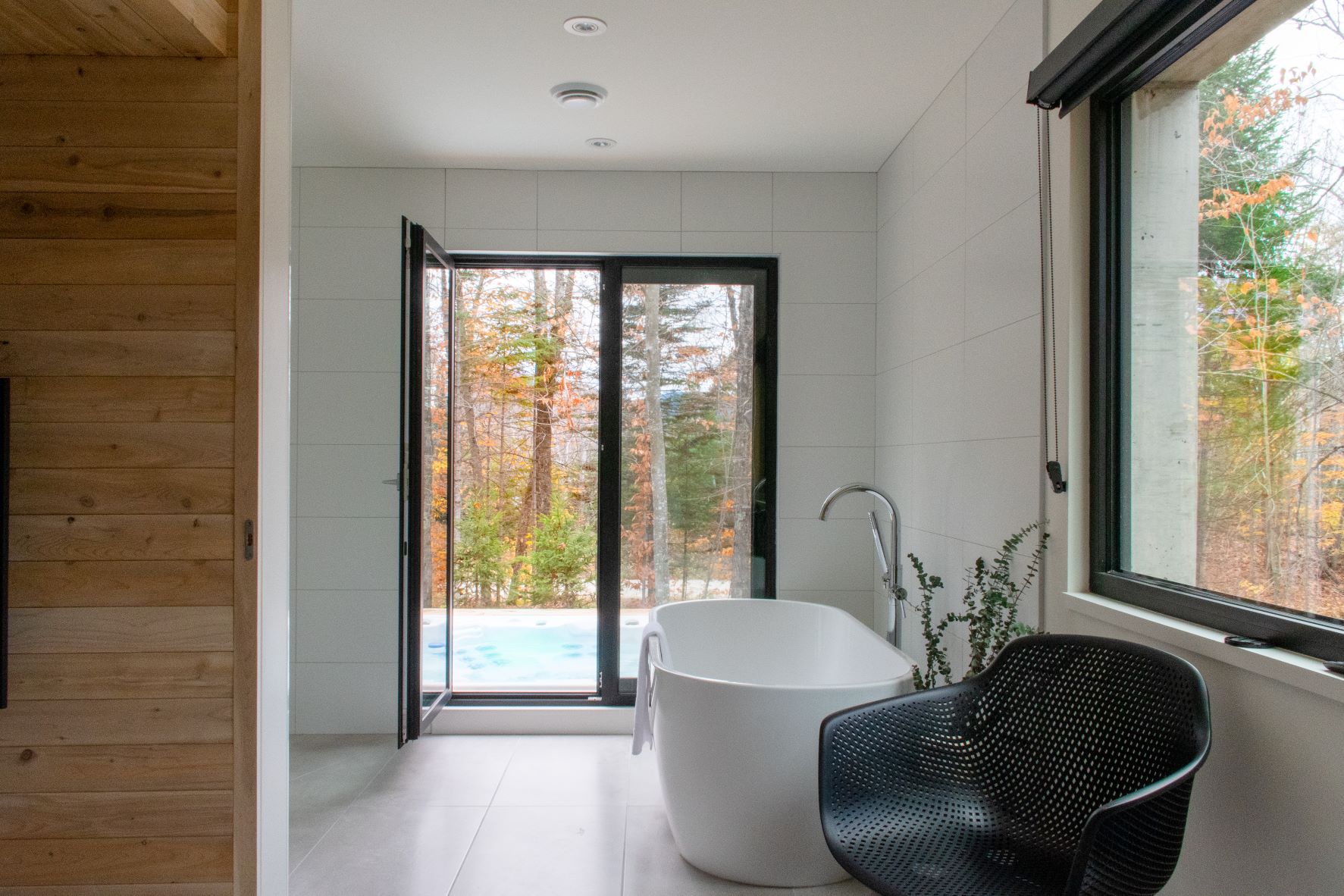 Cabin Spahaus, near Mont Tremblant Quebec, is a 2-bedroom Airbnb vacation rental featuring a spa experience of hot tub, sauna and open shower. This cottage rental includes access to an all-season luxury resort offering full amenities.