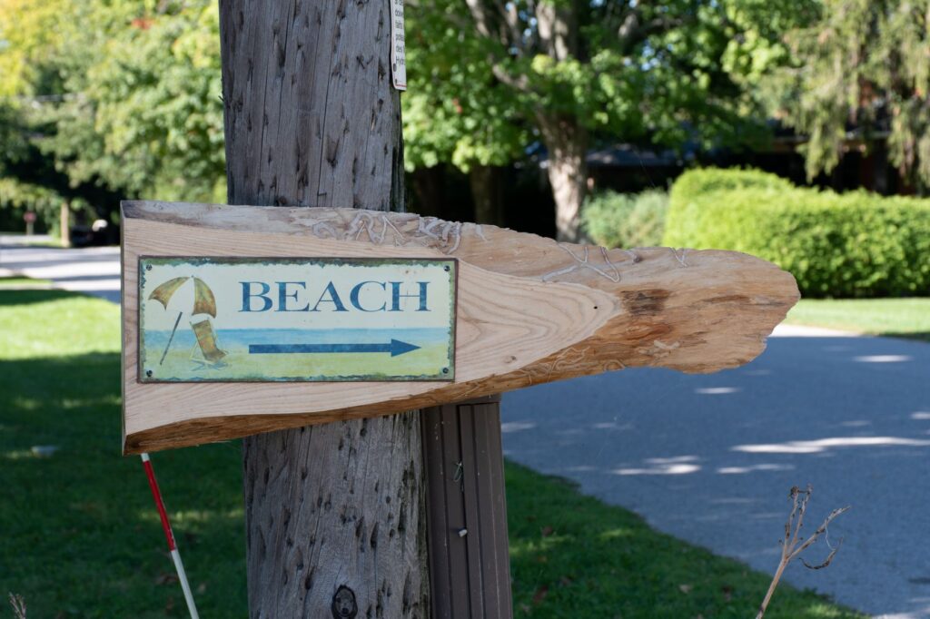 sign pointing to beach in Bayfield canada
