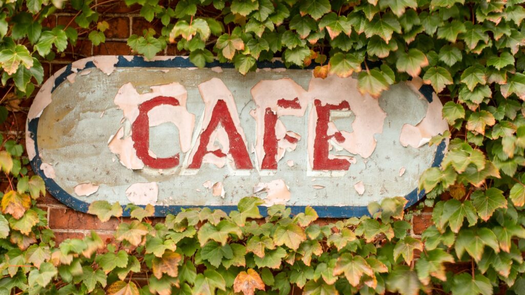 cafe sign with ivy in prince edward county ontario