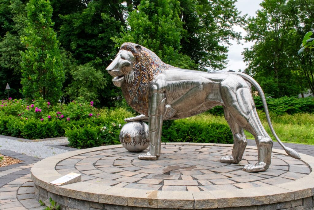 outdoor art gallery of metal lion in eastern quebec area of townships