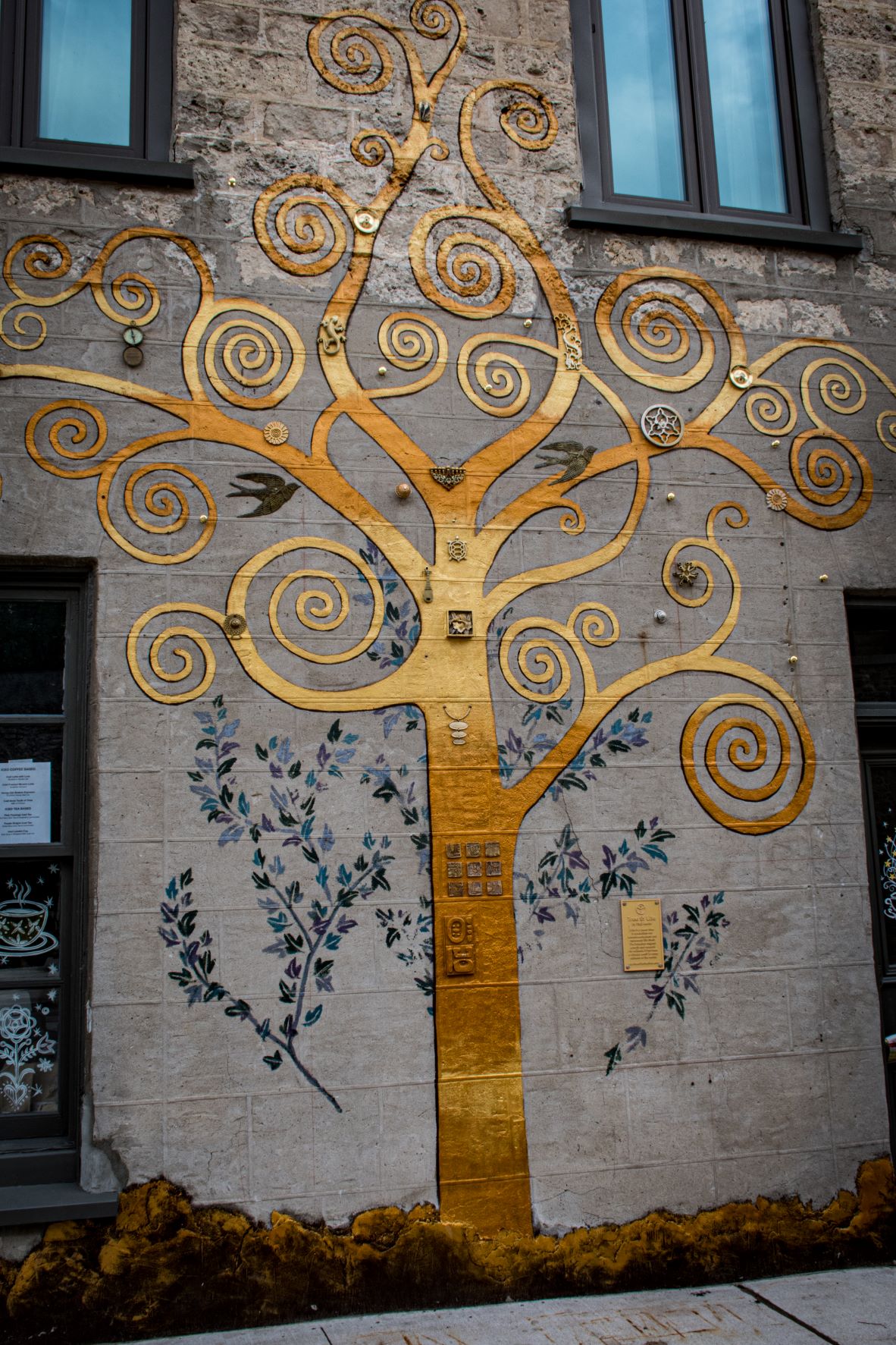 art display of tree on building