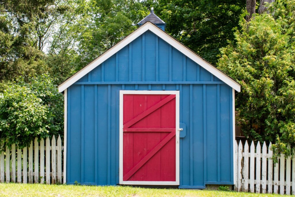 blue shed with red door in norfolk county
