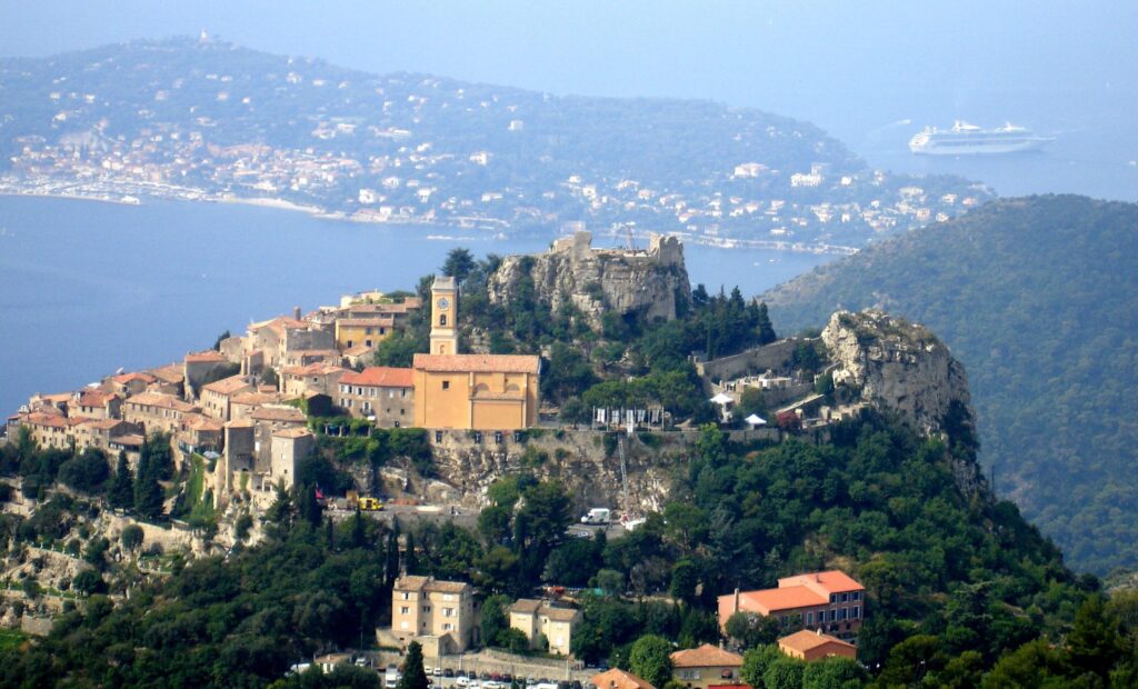 village perched on hilltop with views of sea and mountain as one of the best places to visit from Nice