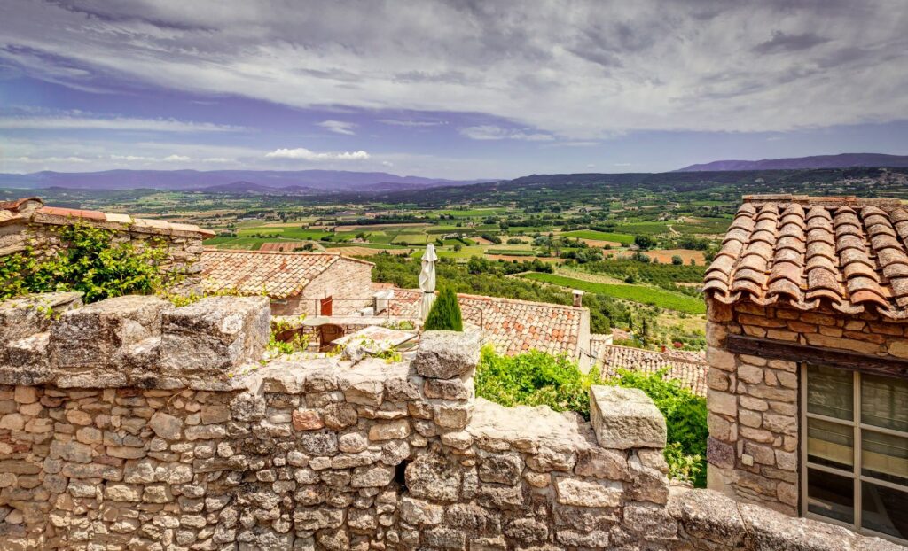 Best Luberon Villages to Visit in Provence 10 stone village with views of Luberon valley in Provence