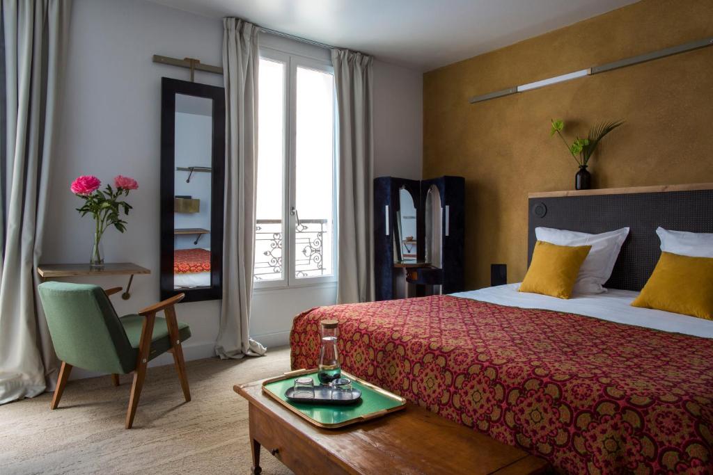 hotel bed and window best boutique hotels in paris
