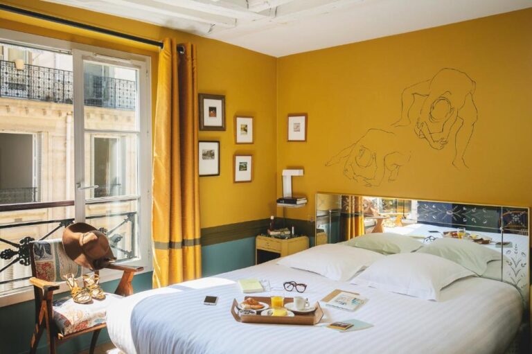 hotel room with yellow walls