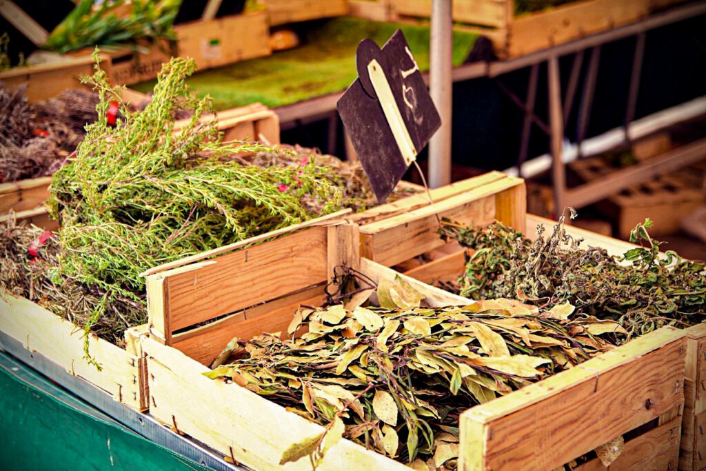 dried herbs in market stall at aix en provence market