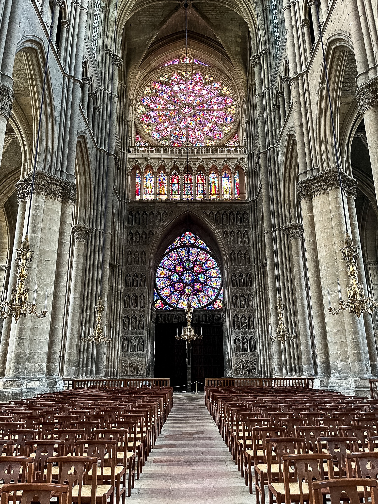 stained glass window inside reims cathedral
